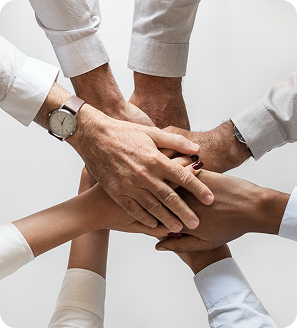Team hands stacked together
